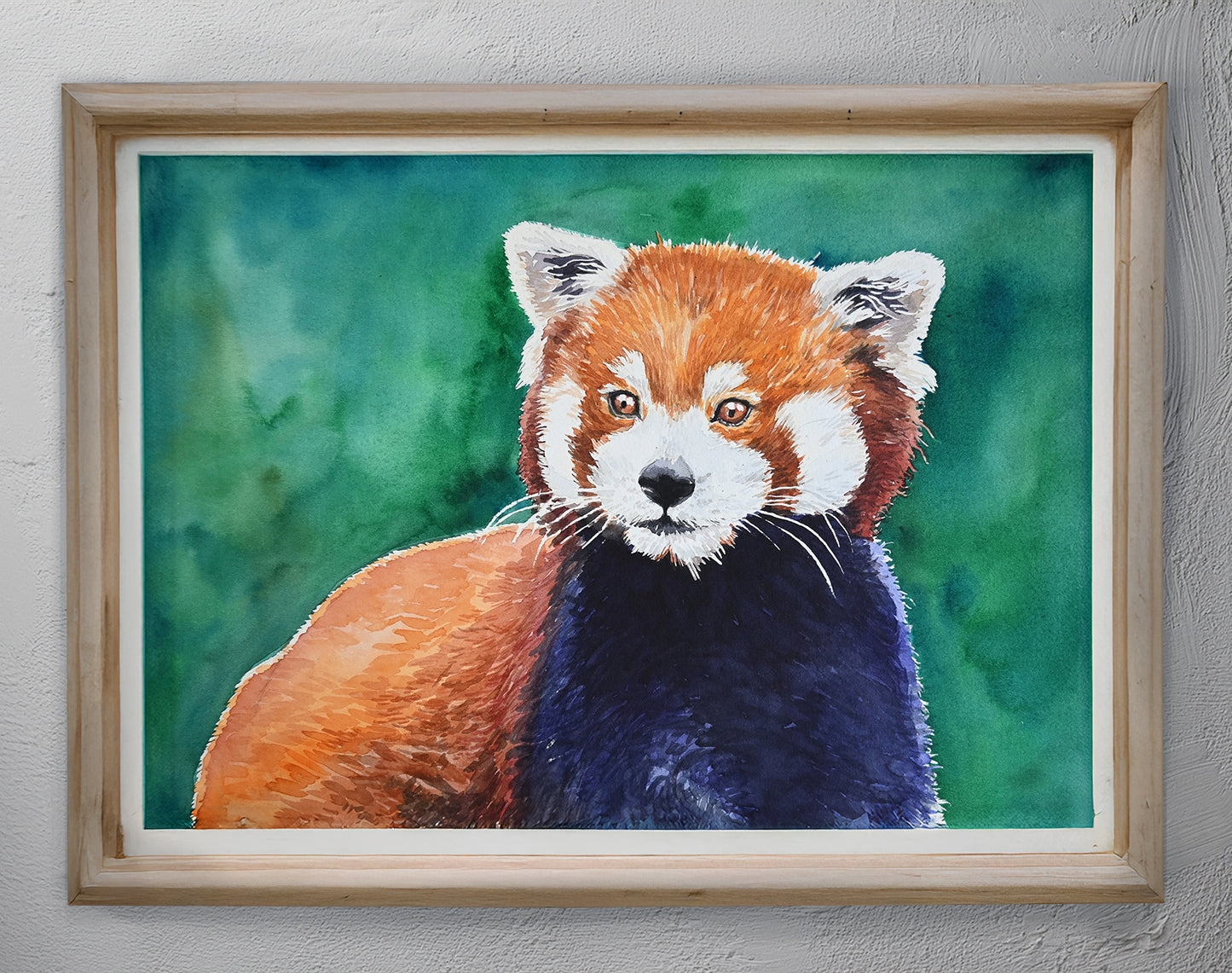 Framed artwork of a red panda with a green background