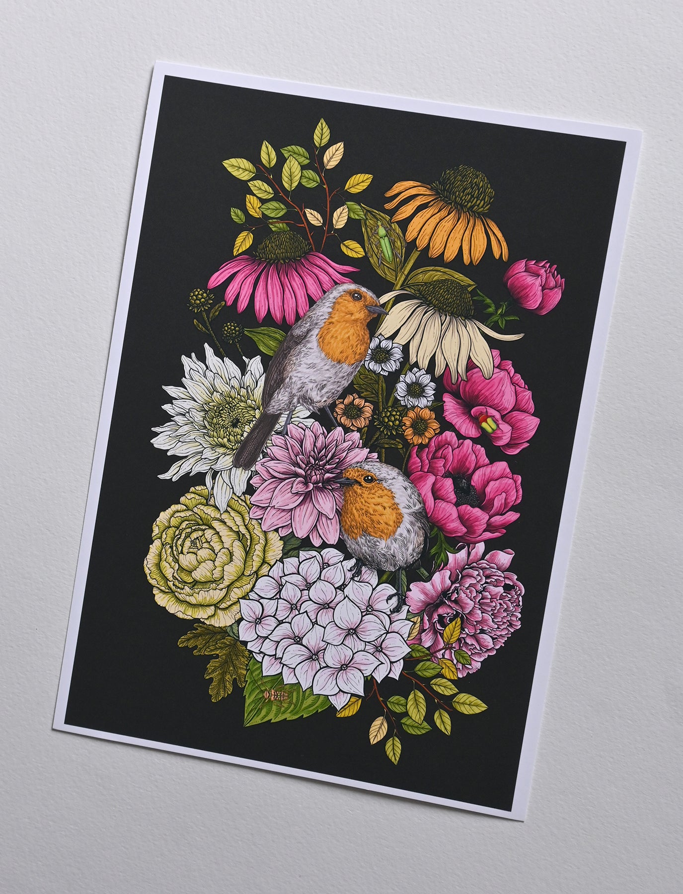 print of an illustration of two robin birds and bouquet of garden flowers on a white background