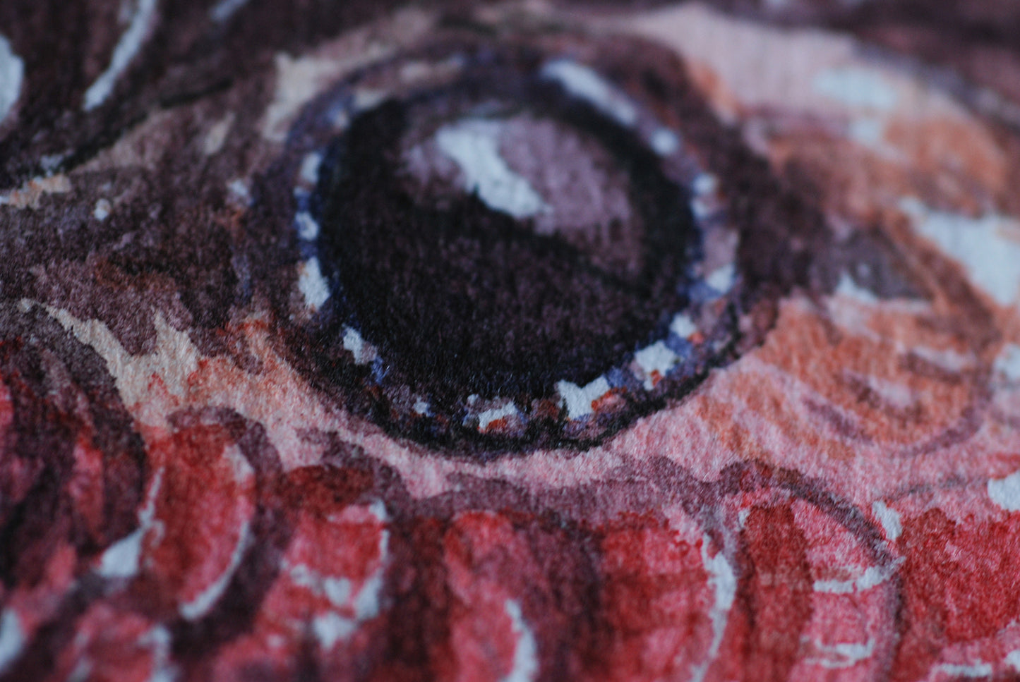 Close-up of a hummingbird eye painted with watercolors