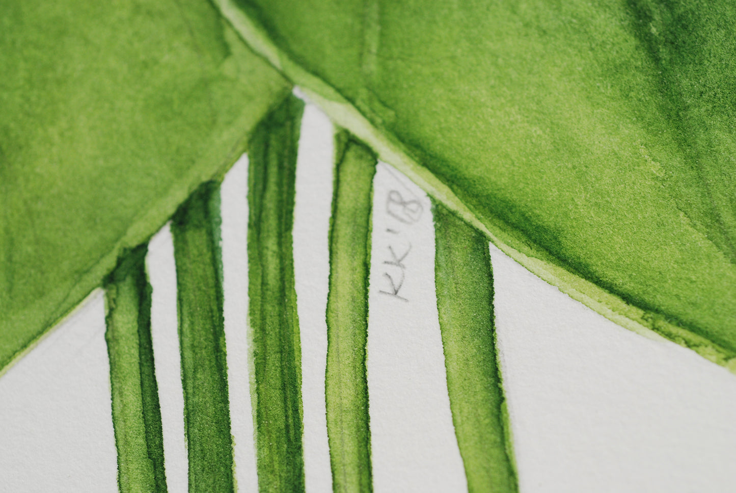 close up of a watercolor painting with initials