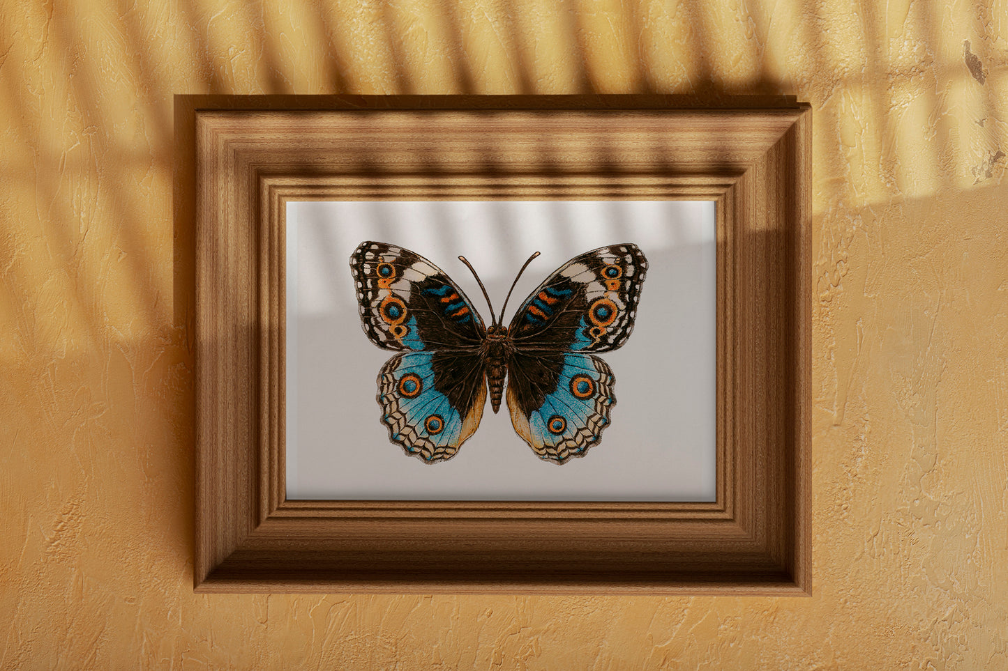 Framed Blue Pansy Butterfly painting on a beige wall