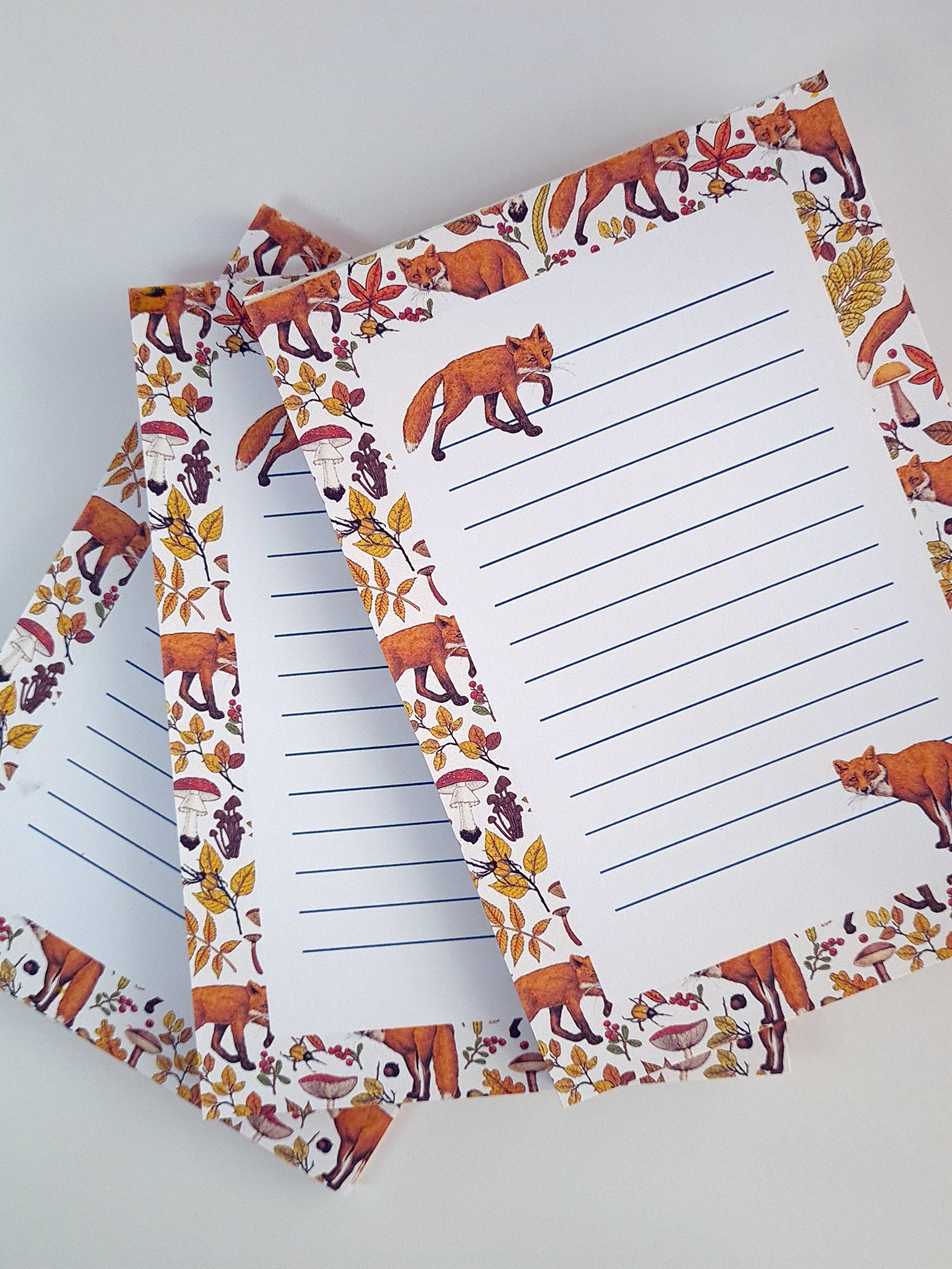 notepad ilustrated with hand-painted red Foxes and autumn flora