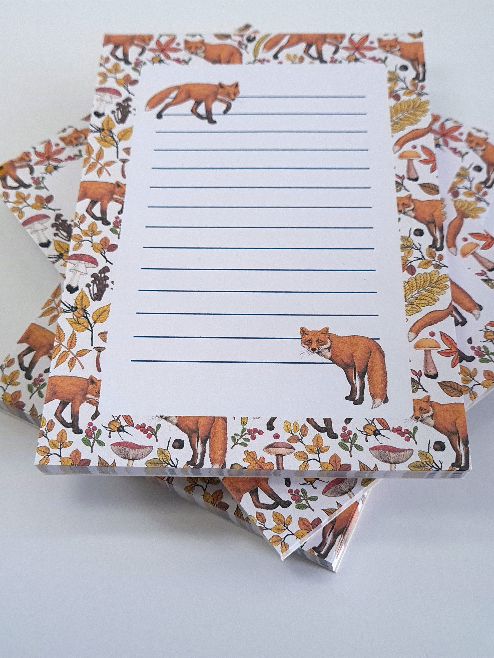 notepads ilustrated with hand-painted red Foxes and autumn flora