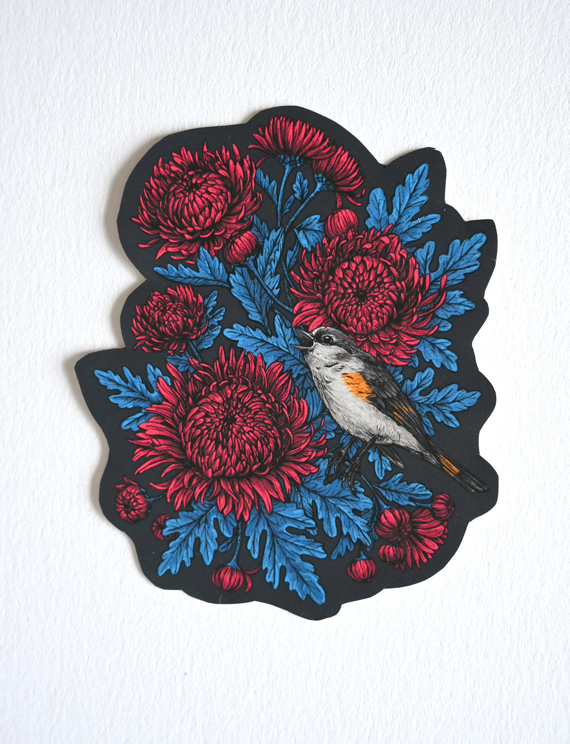 Red Mums with blue leaves and redstart bird vinyl sticker