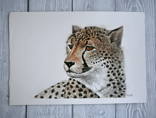 Detailed watercolor portrait of a cheetah on a textured surface