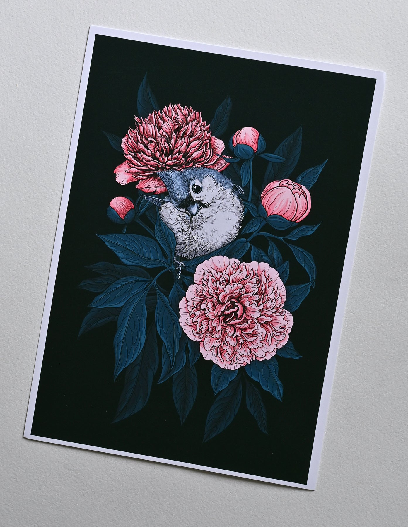 print of a titmouse bird on pink peony flowers with blue leaves on a black background