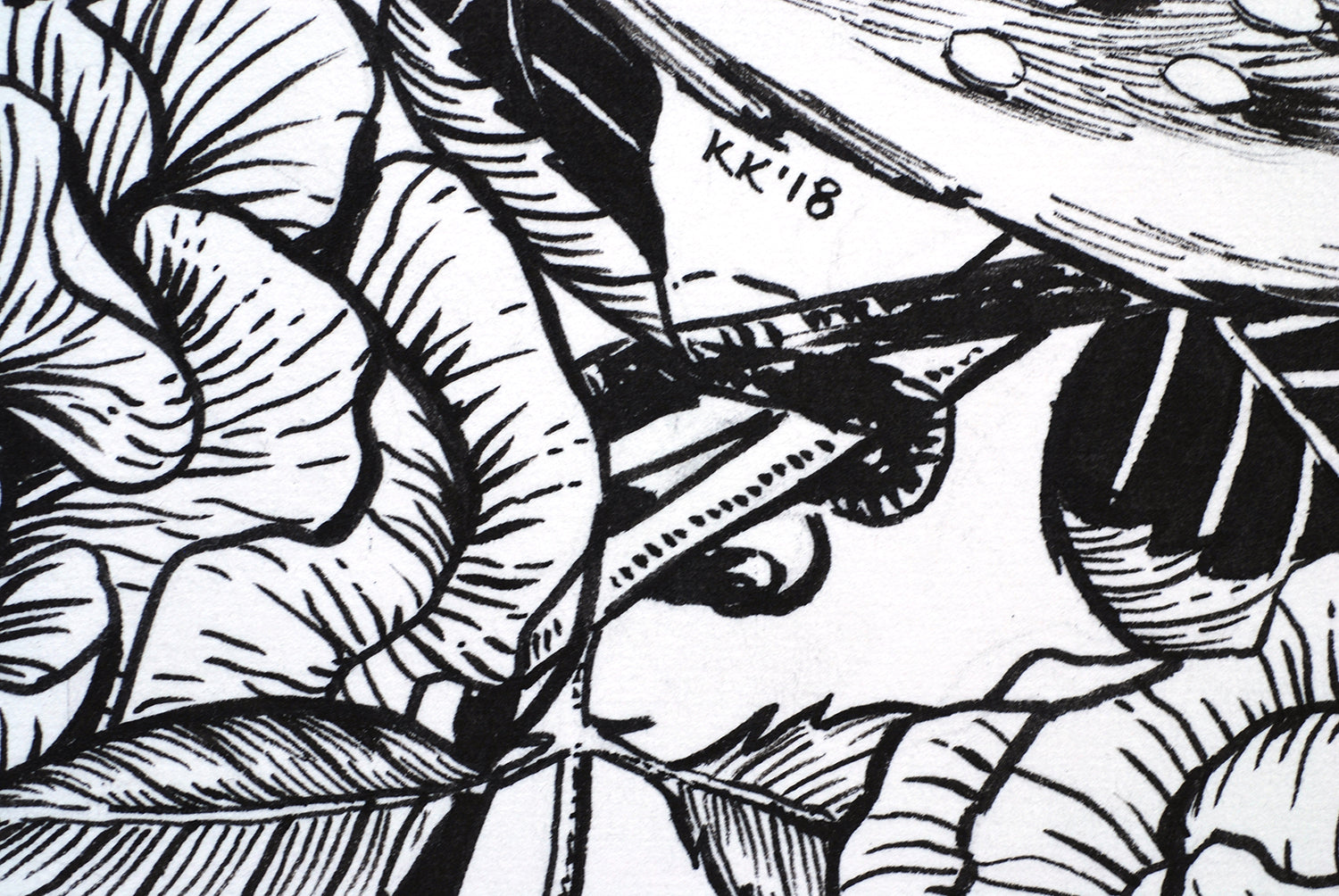 Black and white line art of leaves with a signature 'KK' '18' in the center.