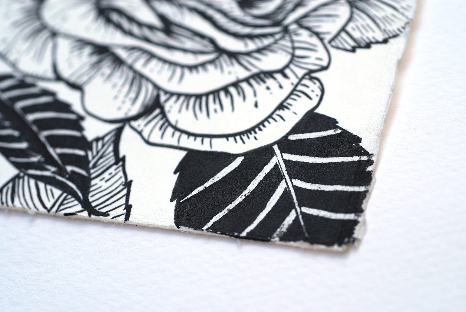 Close up on the corner f an ink drawing