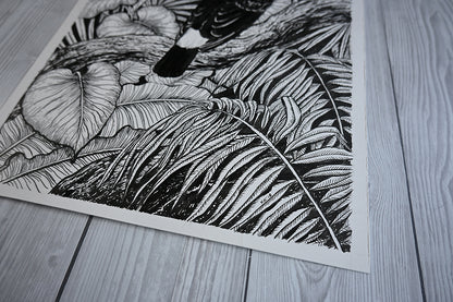 close up corner photo of a original painting of a toucan perching on dry wood in the jungle painted with black ink