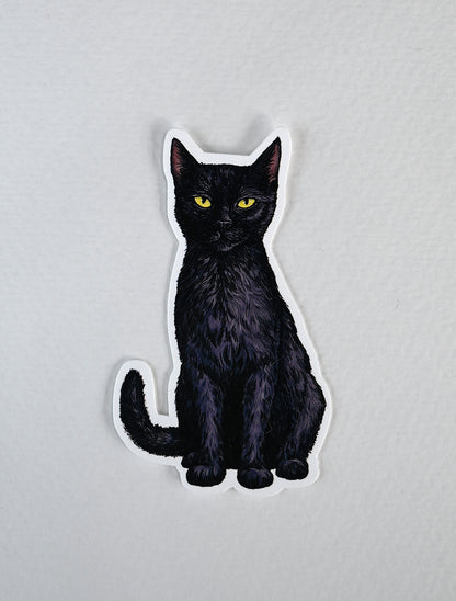 Black cat sticker on a white background