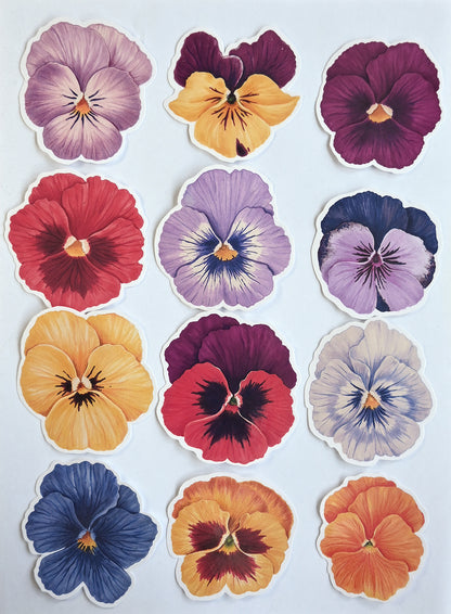 12 Colorful pansy flower stickers arranged in a grid on a light background