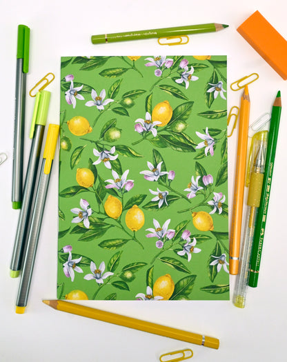 photo of hand-made notebook with hand-painted lemon pattern print on the cover