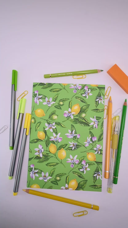 video showing a hand-made notebook with hand-painted lemon pattern print on the cover