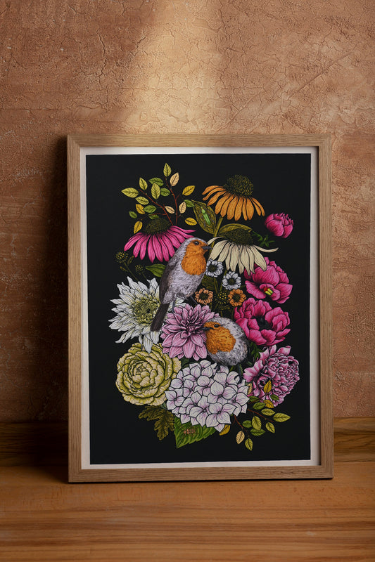 framed print of an illustration of two robin birds and bouquet of garden flowers